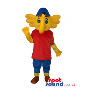 Funny Yellow Elephant Mascot Wearing Red And Blue Clothes -