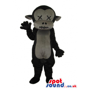 Black Plush Monkey Mascot With A Grey Belly And Stitched Eyes -