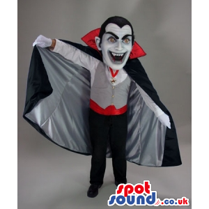 Realistic Dracula Halloween Character Mascot With White Face -