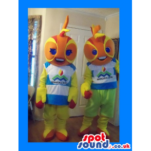 Orange Boy And Girl Fish Couple Mascots Wearing Clothes And