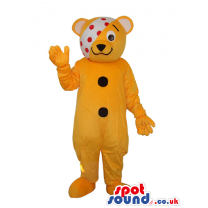 Cute Yellow Teddy Bear Plush Mascot With A Bandage Over Its Eye