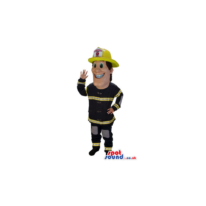 Happy Human Mascot Wearing Black And Yellow Fireman Garments -