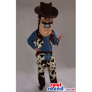 Angry Cowboy Character Mascot With Blue And Beige Clothes -