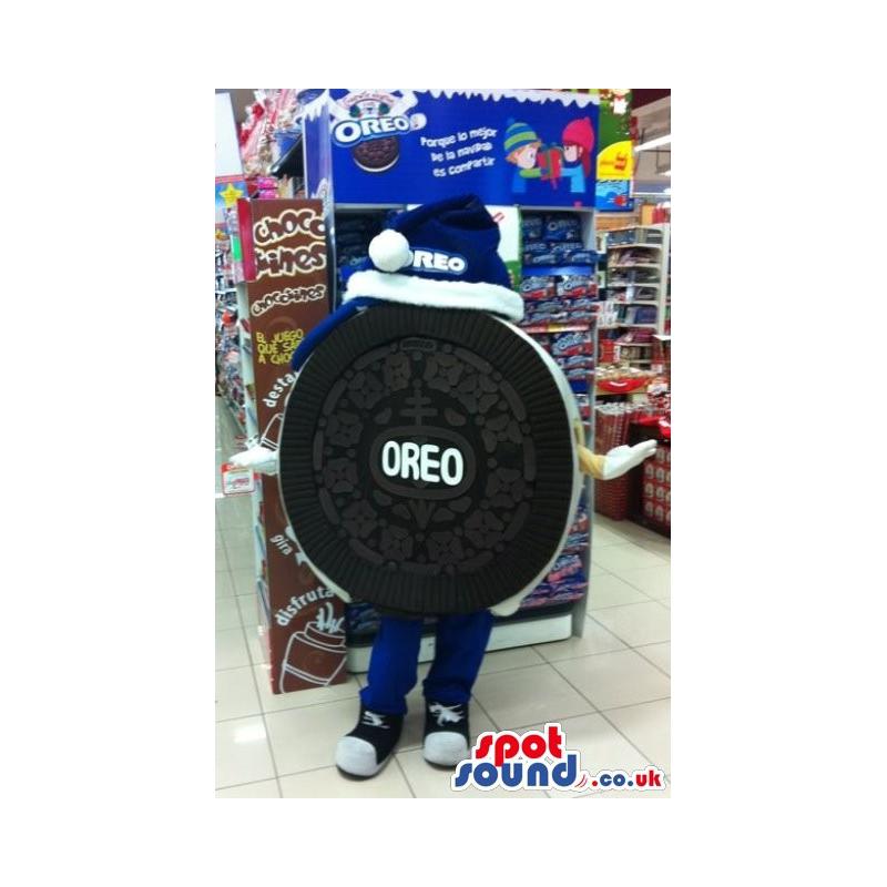 Super bass drum mascot with a cute cap giving a welcome pose -