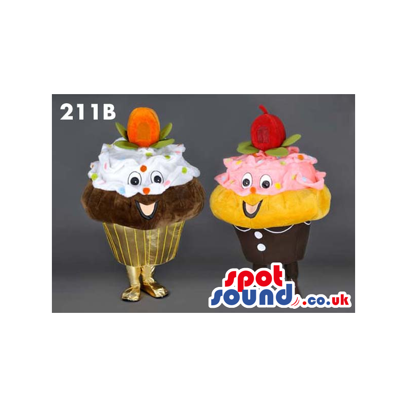 Two Cupcake Food Mascots With Big Fruit And Colorful Frosting -