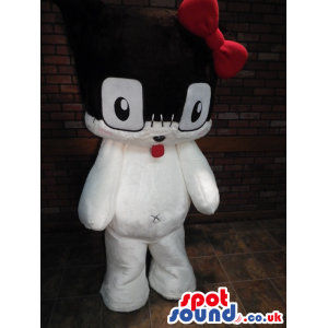 White And Black Cute Plush Mascot With A Red Ribbon And Tongue