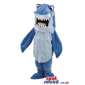 Blue shark mascot with his mouth open showing his sharp teeth -