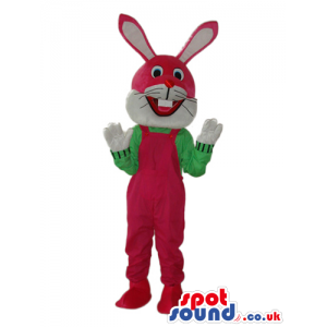 Red And White Rabbit Plush Mascot Wearing Red Overalls. -
