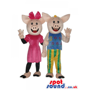 Pig Couple Mascots With Boy And Girl Flashy Garments - Custom