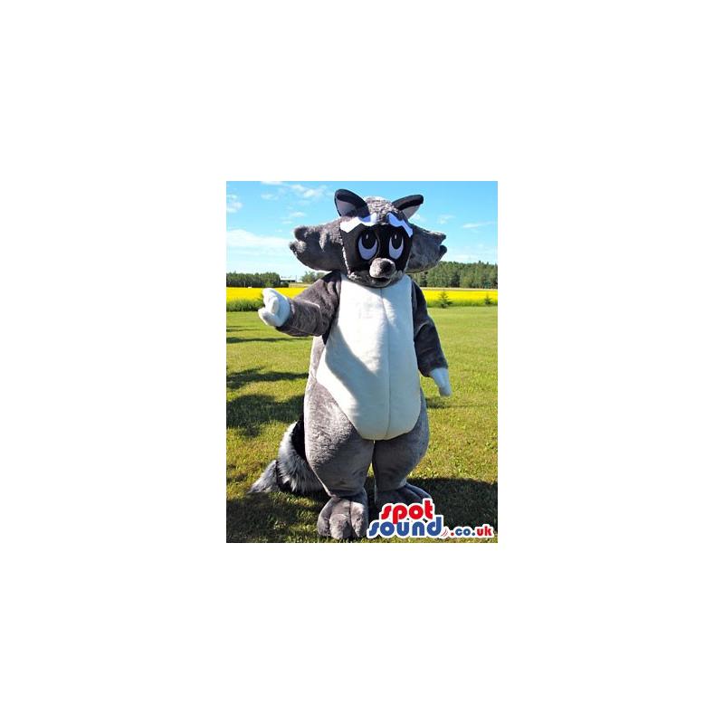 Giant black and white mascot with a cute look waving hand -