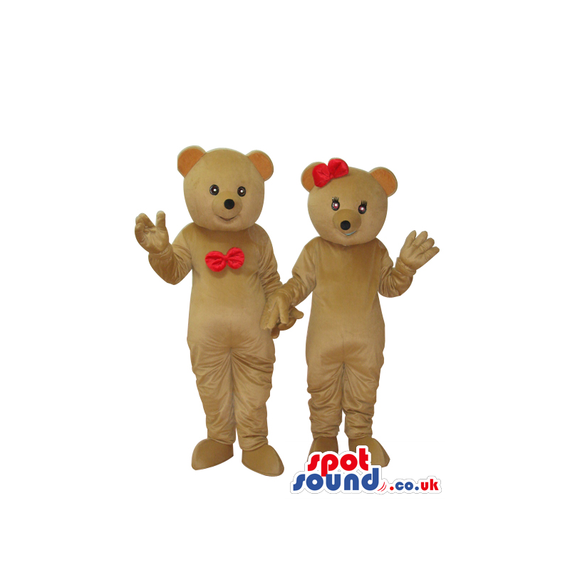 Boy And Girl Brown Teddy Bear Couple Mascots With Red Ribbons -