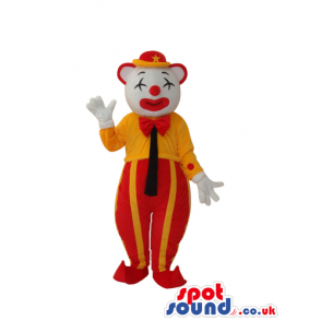 White Clown Mascot With Shut Eyes And Yellow And Red Clothes -