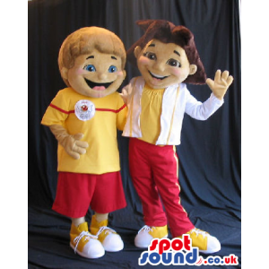 Boy And Girl Couple Mascot Wearing Yellow And Red Sports