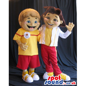 Boy And Girl Couple Mascot Wearing Yellow And Red Sports