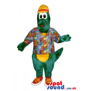 Green Alligator Mascot Wearing A Hawaiian Shirt And A Hat -