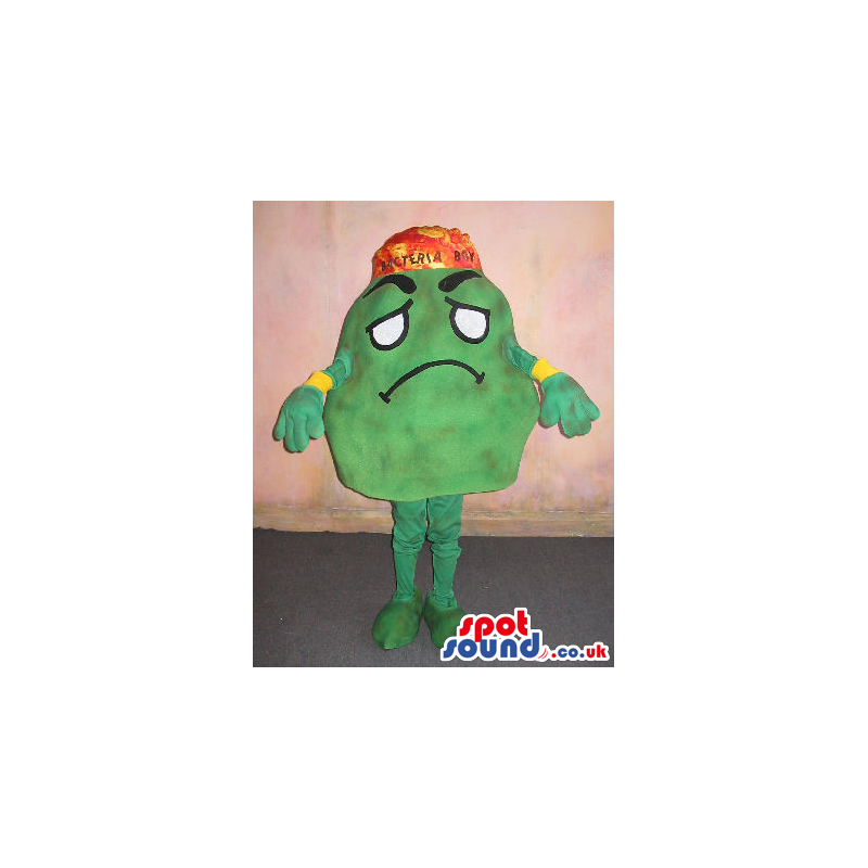 Amazing Green Bacteria Mascot Wearing An Orange Hat With Text -