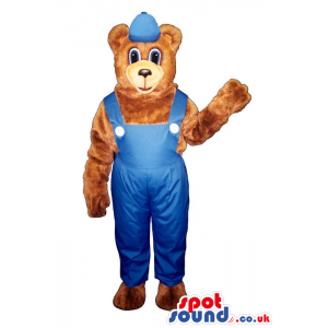 Cartoon Brown Bear Plush Mascot Wearing Blue Overalls And A Cap