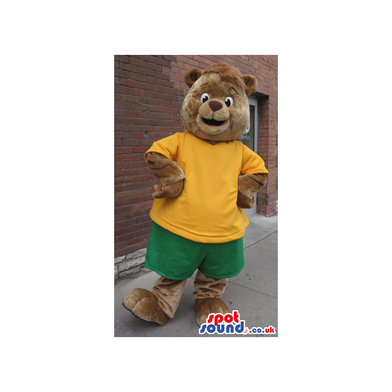 Brwon Bear Plush Mascot Wearing A Yellow T-Shirt And Shorts -