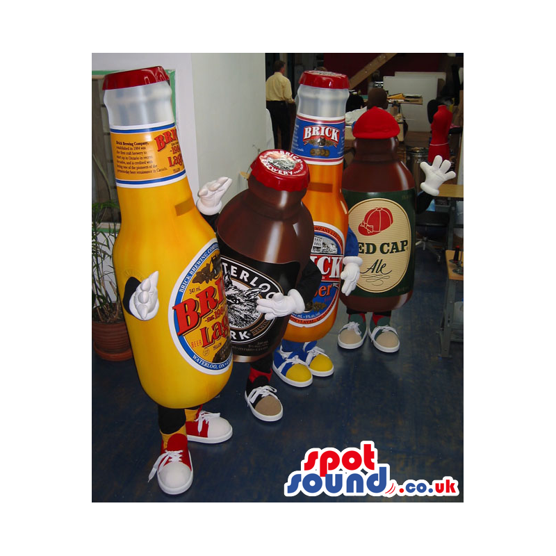 Group Of Four Beer Bottle Mascots With Brand Names And Logos -
