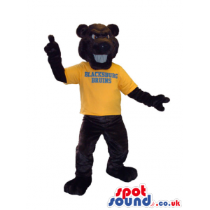 Dark Brown Bear Plush Mascot Wearing A Yellow T-Shirt With Text