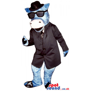 Blue Cow Animal Mascot Wearing An Elegant Suit And Sunglasses -