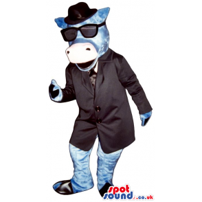 Blue Cow Animal Mascot Wearing An Elegant Suit And Sunglasses -