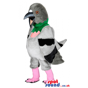 Big pigeon mascot with grey and black wings and green neck -