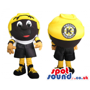 Yellow And Black Big Helmet Mascot With A Funny Face And Logo -