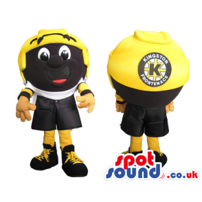 Yellow And Black Big Helmet Mascot With A Funny Face And Logo -