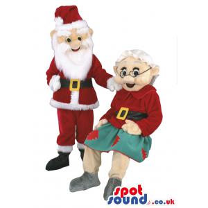 Santa and his wife, wearing their red colour christmas costumes