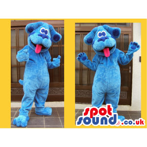 Giant blue standing dog mascot with tongue hanging out