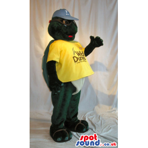 Cute Turtle Plush Mascot Wearing A Yellow T-Shirt With Text -