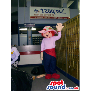 Lady mascot wearing hat and pink top, blue trousers, red shoes