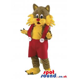 Beige and yellow cat mascot in a red colour jumper shorts