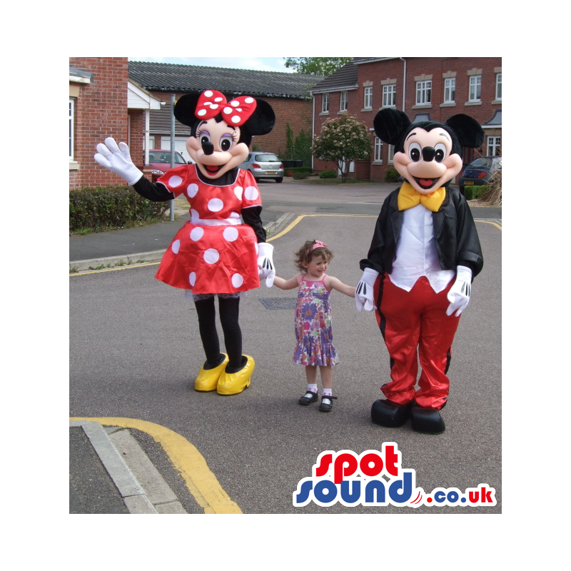 Mickey mouse in smart outfit and minnie mouse in polka dress -