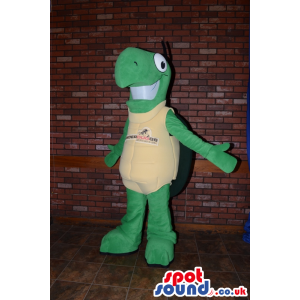 Cute Turtle Plush Mascot Wearing With A Yellow Body With Text -