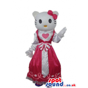 Kitty Cat Cartoon Mascot Wearing A Red Dress With A Heart. -