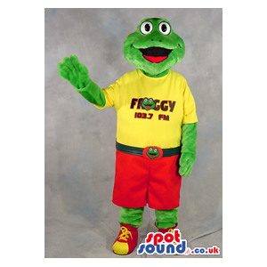Green Frog Plush Mascot Wearing A Yellow T-Shirt With Text -