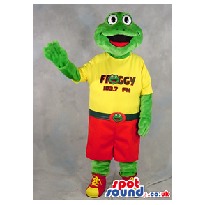 Green Frog Plush Mascot Wearing A Yellow T-Shirt With Text -