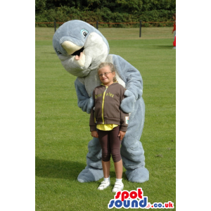 Open beak with tongue, grey dolphin mascot with white