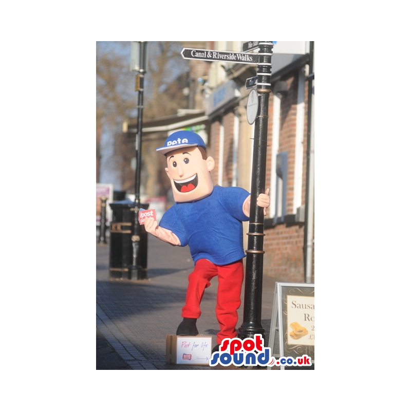 Smiling blue postman mascot with blue hat and red trousers -