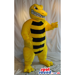 Yellow Angry Alligator Mascot With Black Stripes On Its Belly -