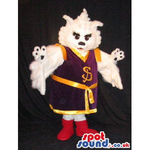 White Bird Mascot Wearing Purple And Golden Sports Clothes -