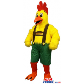 Flashy Yellow Chicken Plush Mascot Wearing Tyrol Overalls. -