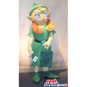 Dwarf Character Mascot In Green Clothes With A Star Bag. -