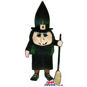 Halloween Witch Mascot With A Black Long Hat And A Broom. -