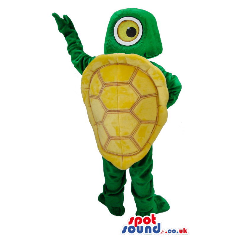 Standing green turtle with big round eyes and yellow shell -