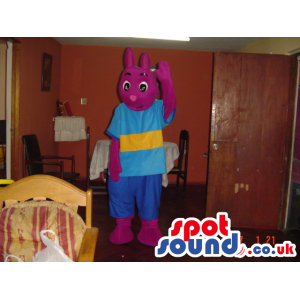 Purple Rabbit Plush Mascot Wearing A Blue And Yellow T-Shirt -