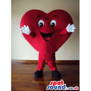 Fired up heart mascot with white gloves and black shoes -