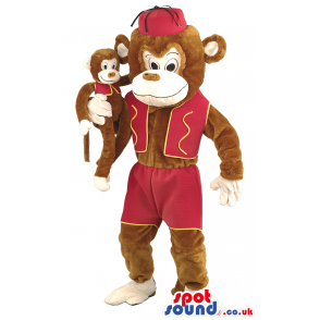 Brown monkey mascot with red fez and baby monkey in hands -